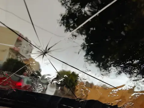 A star crack in a windshield from a stone chip